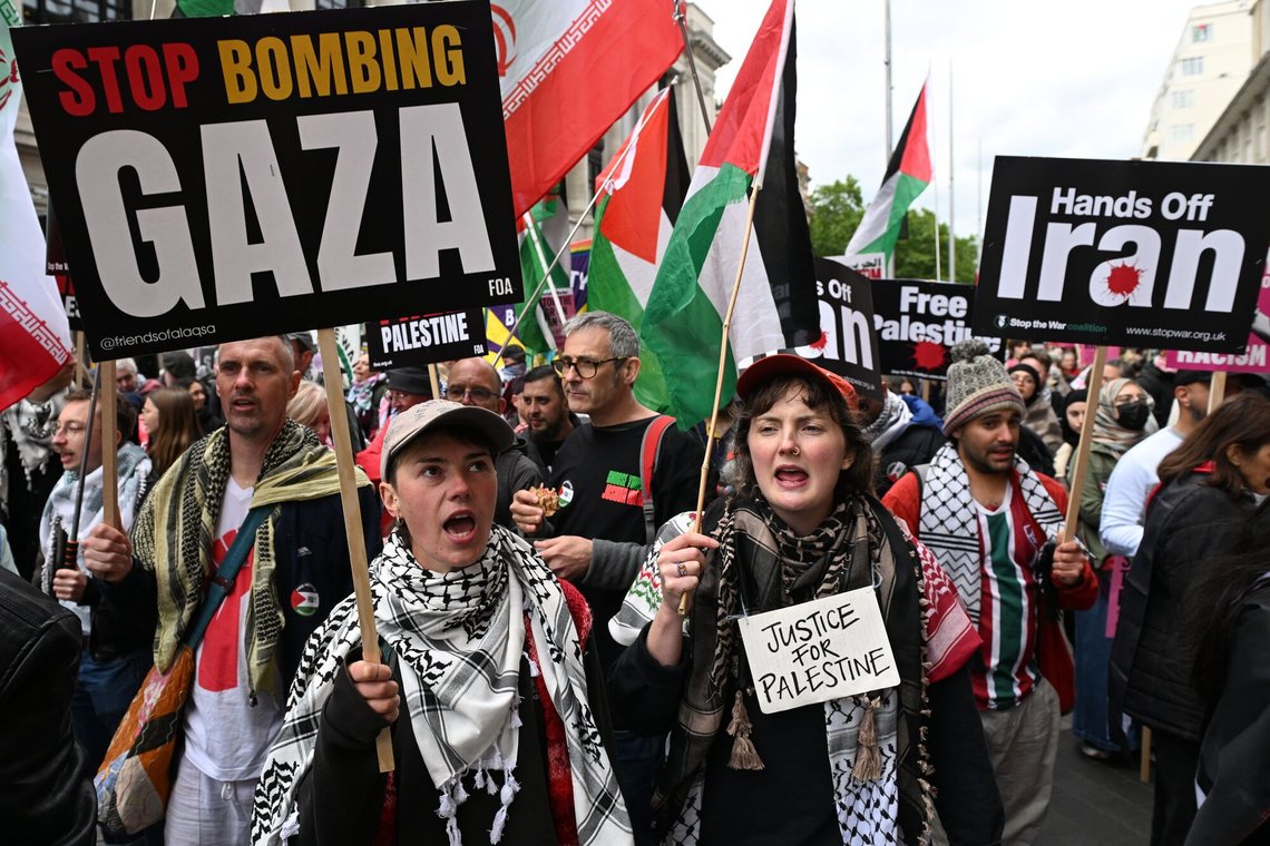 Protesters carry posters and flags during a Pro-Palestine march in London, Saturday, May 16, 2026.(AP Photo/Thomas Krych) Protesters carry posters and flags during a Pro-Palestine march in London, Saturday, May 16, 2026.(AP Photo/Thomas Krych)