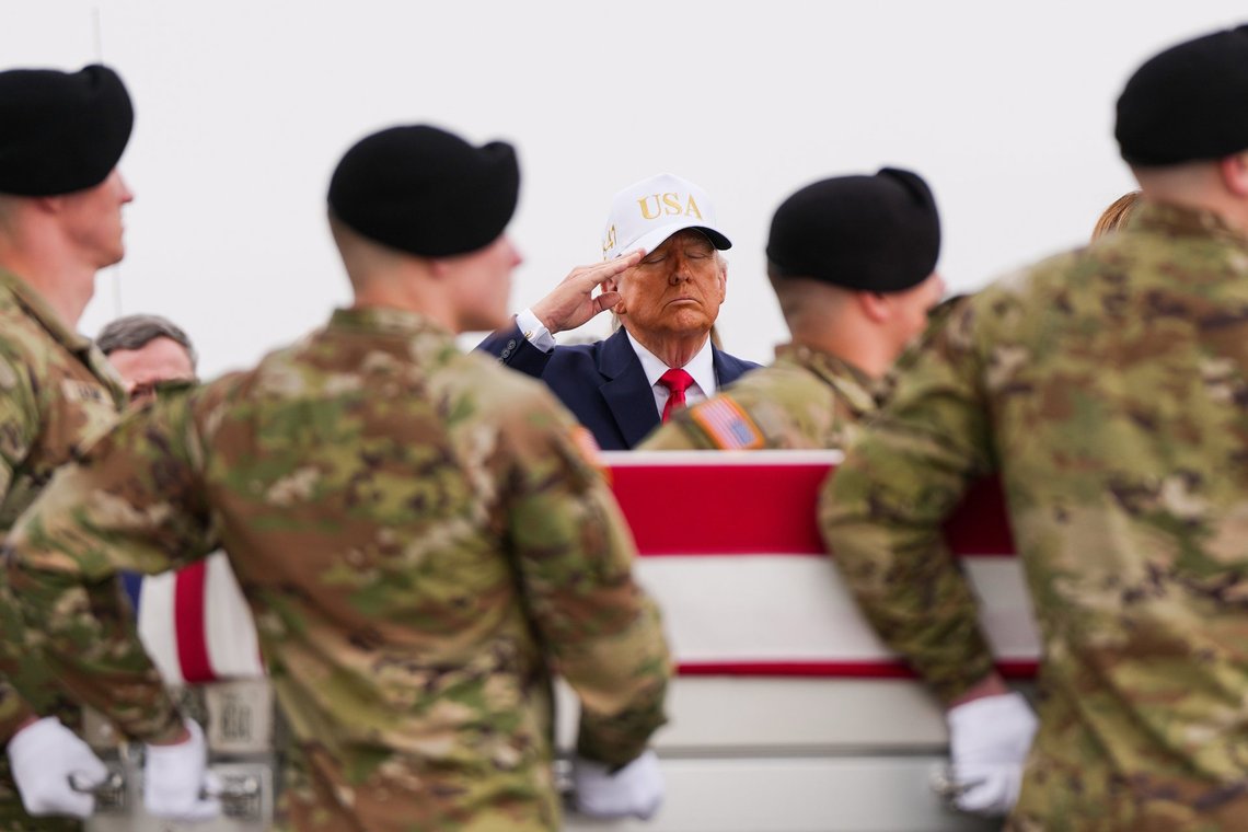 FILE - President Donald Trump salutes as an Army carry team moves a flag-draped transfer case with the remains of Sgt. Declan Coady, 20, of West Des Moines, Iowa, who was killed in a drone strike at a command center in Kuwait after the U.S. and Israel launched their military campaign against Iran, during a casualty return, March 7, 2026, at Dover Air Force Base, Del. (AP Photo/Julia Demaree Nikhinson, File) FILE - President Donald Trump salutes as an Army carry team moves a flag-draped transfer case with the remains of Sgt. Declan Coady, 20, of West Des Moines, Iowa, who was killed in a drone strike at a command center in Kuwait after the U.S. and Israel launched their military campaign against Iran, during a casualty return, March 7, 2026, at Dover Air Force Base, Del. (AP Photo/Julia Demaree Nikhinson, File)