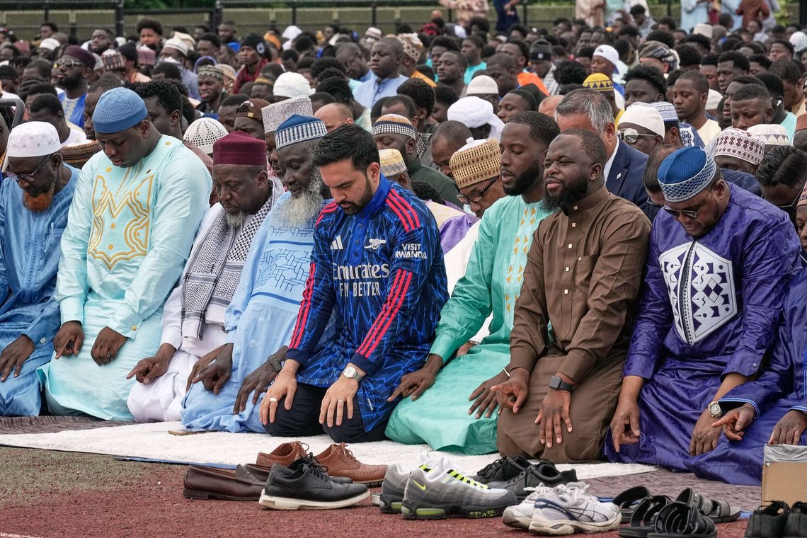 New York Mayor Zohran Mamdani, fourth from right, prays during an Eid al-Adha service, in the Bronx borough of New York, Wednesday, May 27, 2026. (AP Photo/Richard Drew) New York Mayor Zohran Mamdani, fourth from right, prays during an Eid al-Adha service, in the Bronx borough of New York, Wednesday, May 27, 2026. (AP Photo/Richard Drew)