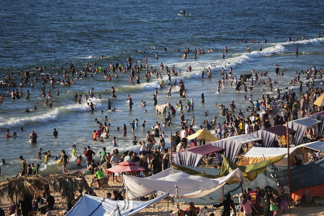 Palestinians enjoy the beach of the Mediterranean Sea during a heat wave in Nuseirat, central Gaza Strip Friday, June 19, 2026. (AP Photo/Abdel Kareem Hana) Palestinians enjoy the beach of the Mediterranean Sea during a heat wave in Nuseirat, central Gaza Strip Friday, June 19, 2026. (AP Photo/Abdel Kareem Hana)