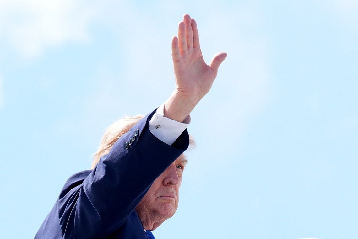 President Donald Trump waves as he boards Air Force One in Hagerstown, Md., Friday, July 31, 2026, after attending a cabinet meeting at Camp David, the presidential retreat. (AP Photo/Jacquelyn Martin) President Donald Trump waves as he boards Air Force One in Hagerstown, Md., Friday, July 31, 2026, after attending a cabinet meeting at Camp David, the presidential retreat. (AP Photo/Jacquelyn Martin)