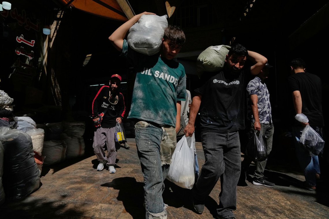 People carry packages at Tehran's historic Grand Bazaar, Iran, Monday, June 1, 2026. (AP Photo/Vahid Salemi) People carry packages at Tehran's historic Grand Bazaar, Iran, Monday, June 1, 2026. (AP Photo/Vahid Salemi)