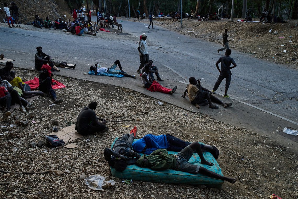 Migrants who crossed into Spain from Morocco sit outside the temporary immigrant stay center (CETI) in the Spanish enclave of Ceuta, Sunday, Aug. 2, 2026. (AP Photo/Bernat Armangue) Migrants who crossed into Spain from Morocco sit outside the temporary immigrant stay center (CETI) in the Spanish enclave of Ceuta, Sunday, Aug. 2, 2026. (AP Photo/Bernat Armangue)