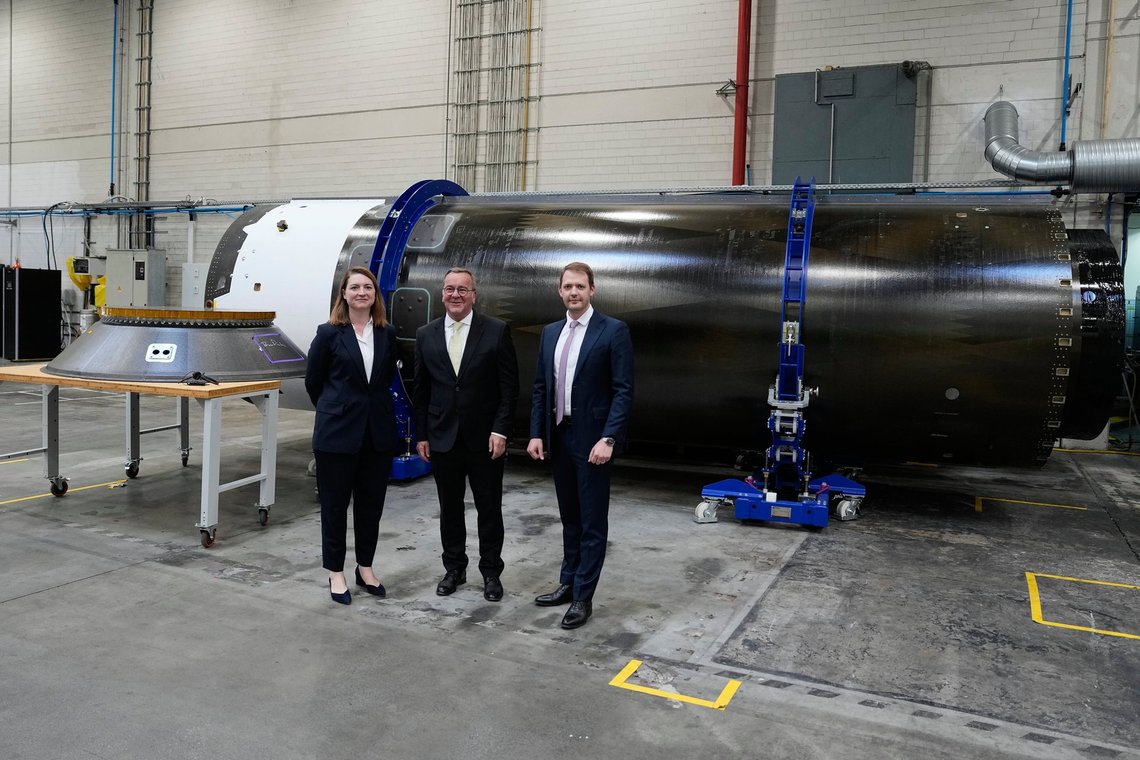 Isar Aerospace CEO Daniel Metzler, right, German Defence Minister Boris Pistorius, center, and Andronike Amponsah, Vice President Defense and Government Programs, pose for a photo during a visit to Isar Aerospace in Munich, Germany, Thursday, July 23, 2026. (AP Photo/Matthias Schrader) Isar Aerospace CEO Daniel Metzler, right, German Defence Minister Boris Pistorius, center, and Andronike Amponsah, Vice President Defense and Government Programs, pose for a photo during a visit to Isar Aerospace in Munich, Germany, Thursday, July 23, 2026. (AP Photo/Matthias Schrader)