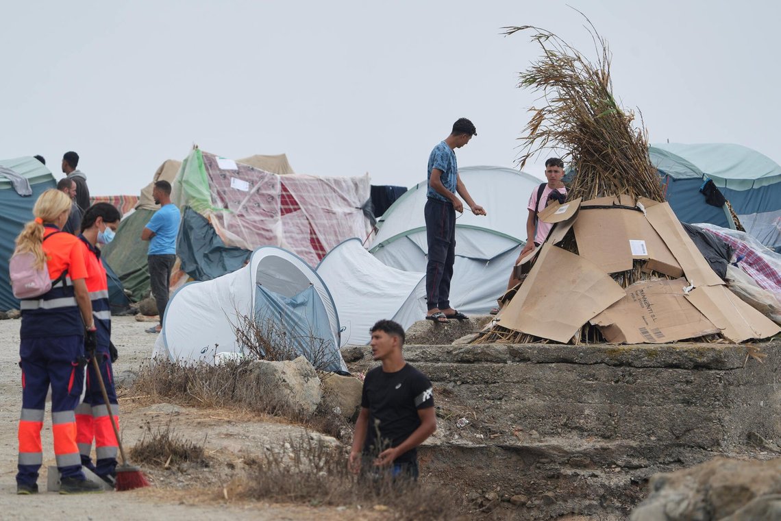 Migrants stand near their tents at El Trampolín beach in the Spanish exclave of Ceuta, Wednesday, Sept. 2, 2026. (AP Photo/Francis González) Migrants stand near their tents at El Trampolín beach in the Spanish exclave of Ceuta, Wednesday, Sept. 2, 2026. (AP Photo/Francis González)