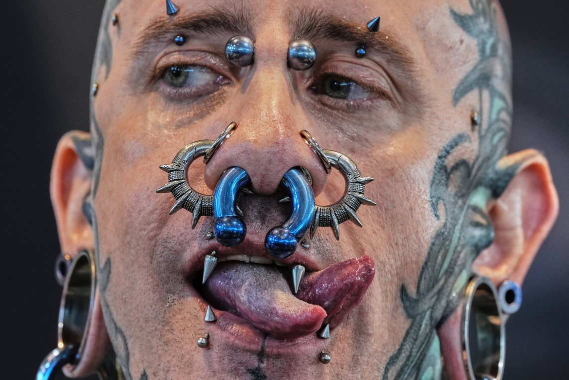 Andrew from Spain shows his split tongue and piercings at the the Gods of Ink Tattoo Convention in Frankfurt, Friday, April 17, 2026. (AP Photo/Michael Probst) Andrew from Spain shows his split tongue and piercings at the the Gods of Ink Tattoo Convention in Frankfurt, Friday, April 17, 2026. (AP Photo/Michael Probst)