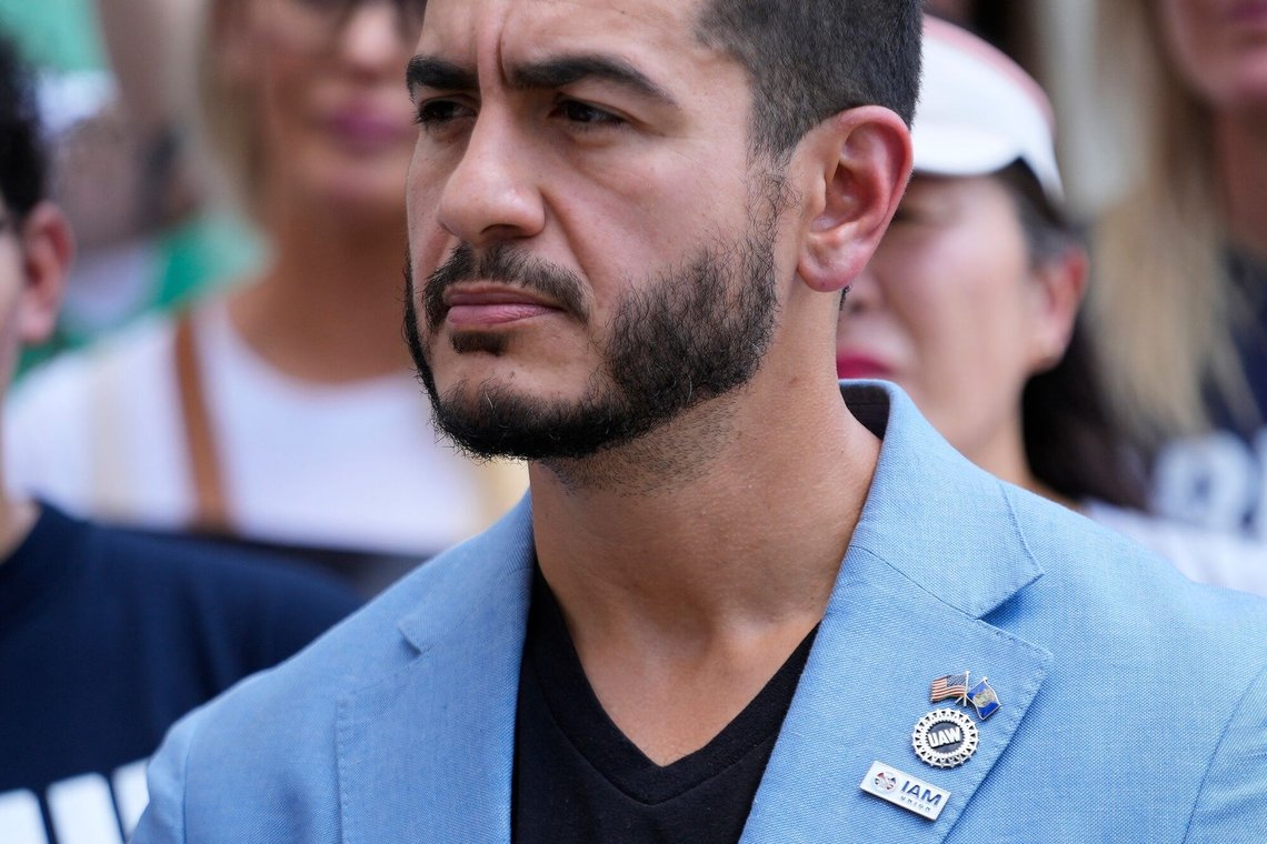 Democratic nominee for U.S. Senate Abdul El-Sayed listens during a news conference at the base of the Spirit of Detroit monument in Detroit, Wednesday, Aug. 19, 2026. (AP Photo/Paul Sancya) Democratic nominee for U.S. Senate Abdul El-Sayed listens during a news conference at the base of the Spirit of Detroit monument in Detroit, Wednesday, Aug. 19, 2026. (AP Photo/Paul Sancya)
