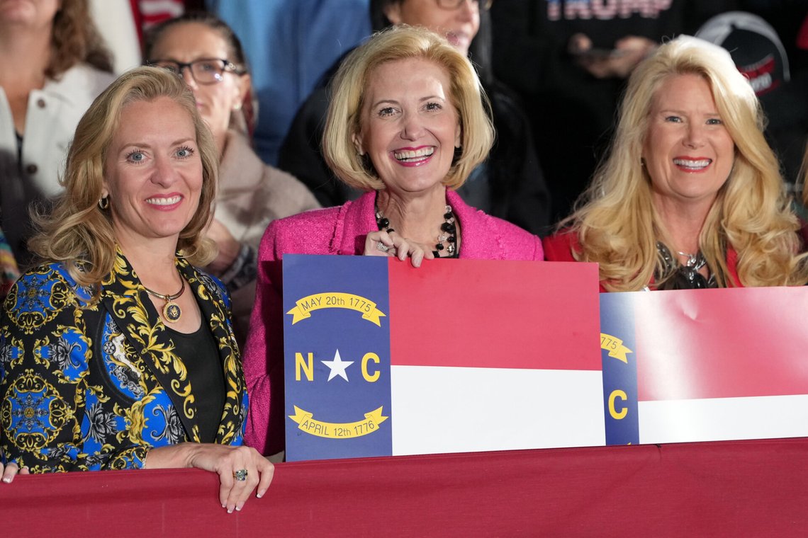 People wait for President Donald Trump to arrive at a campaign rally at Pitt–Greenville Airport, Tuesday, Oct. 20, 2026, in Greenville, N.C. (AP Photo/Alex Brandon) People wait for President Donald Trump to arrive at a campaign rally at Pitt–Greenville Airport, Tuesday, Oct. 20, 2026, in Greenville, N.C. (AP Photo/Alex Brandon)