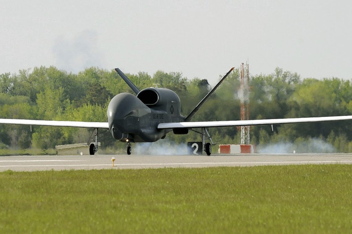 The Biden administration just cleared a Chinese company to own 370 acres of land within 12 miles of Grand Forks Air Force Base in North Dakota. China will be able to use a proposed $700 million corn milling plant on the site to spy on military communications and even disrupt them. Pictured: An RQ-4 Global Hawk drone lands at Grand Forks Air Force Base. (Image source: Johnny Saldivar/Wikimedia Commons) The Biden administration just cleared a Chinese company to own 370 acres of land within 12 miles of Grand Forks Air Force Base in North Dakota. China will be able to use a proposed $700 million corn milling plant on the site to spy on military communications and even disrupt them. Pictured: An RQ-4 Global Hawk drone lands at Grand Forks Air Force Base. (Image source: Johnny Saldivar/Wikimedia Commons)