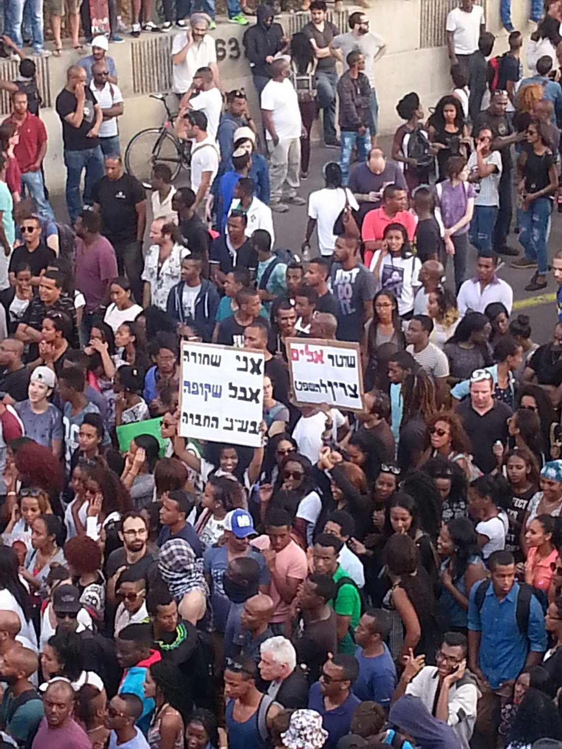 Ethiopian Israelis protest calling for the government to bring their remaining family members from Ethiopia to Israel. In recent years, Israel has allowed limited numbers of Ethiopians to immigrate. But families say thousands more remain behind in Ethiopia. Photo: Lilach Daniel from Israel, CC BY 2.0, Wikimedia Commons Ethiopian Israelis protest calling for the government to bring their remaining family members from Ethiopia to Israel. In recent years, Israel has allowed limited numbers of Ethiopians to immigrate. But families say thousands more remain behind in Ethiopia. Photo: Lilach Daniel from Israel, CC BY 2.0, Wikimedia Commons
