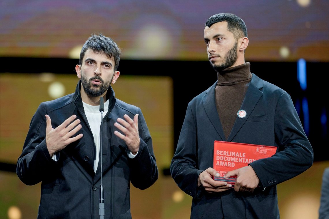 Palestinian Basel Adra, right, and Israeli Yuval Abraham receive the documentary award for "No Other Land" at the International Film Festival, Berlinale, in Berlin, Saturday, Feb. 24, 2024. (AP Photo/Markus Schreiber, File) Palestinian Basel Adra, right, and Israeli Yuval Abraham receive the documentary award for "No Other Land" at the International Film Festival, Berlinale, in Berlin, Saturday, Feb. 24, 2024. (AP Photo/Markus Schreiber, File)