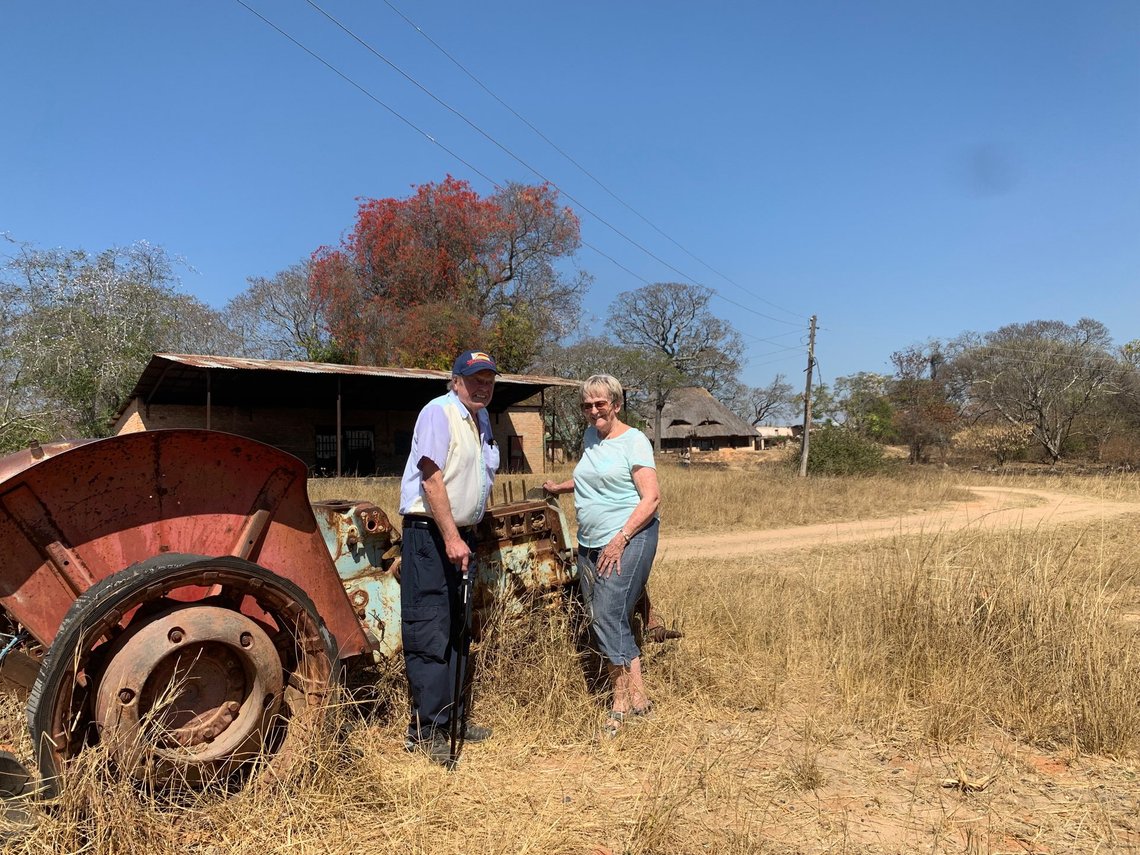 Jocelyne Younghusband and her brother stand beside their father’s tractor on the neglected Elgin Farm, a tobacco farm in Chiwira, Zimbabwe-Rhodesia, which their father vacated in the 1970s when the family moved to South Africa. Their brother is buried on the farm, which is now occupied by multiple black families who use it solely as a place of residence. Photo: Document.news Jocelyne Younghusband and her brother stand beside their father’s tractor on the neglected Elgin Farm, a tobacco farm in Chiwira, Zimbabwe-Rhodesia, which their father vacated in the 1970s when the family moved to South Africa. Their brother is buried on the farm, which is now occupied by multiple black families who use it solely as a place of residence. Photo: Document.news