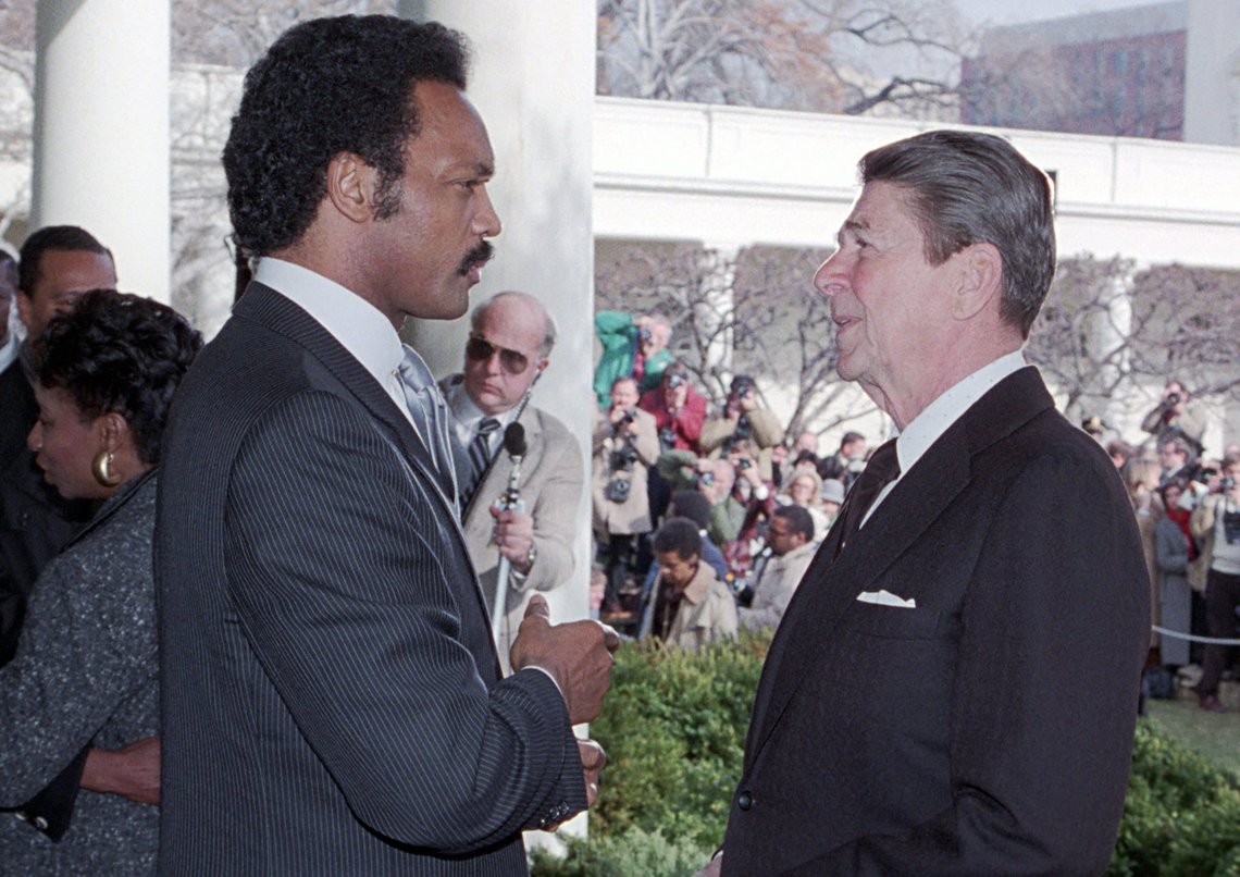 The recently deceased American Baptist minister, activist, politician and presidential candidate Jesse Jackson, here with President Ronald Reagan in the Rose Garden at the White House in 1984, led in 1987 a procession of hundreds of students at Stanford University chanting the slogans “Hey hey, ho ho, Western civ (abbreviation for civilisation) has got to go.” Photo: White House Photographic Office / U.S. National Archives (public domain), via Wikimedia Commons. The recently deceased American Baptist minister, activist, politician and presidential candidate Jesse Jackson, here with President Ronald Reagan in the Rose Garden at the White House in 1984, led in 1987 a procession of hundreds of students at Stanford University chanting the slogans “Hey hey, ho ho, Western civ (abbreviation for civilisation) has got to go.” Photo: White House Photographic Office / U.S. National Archives (public domain), via Wikimedia Commons.