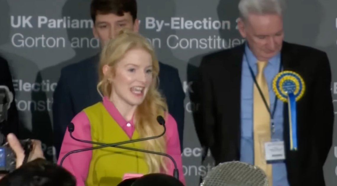 Plumber-turned-politician Hannah Spencer (34) giving her Green Party victory speech. Message segmentation and 'family voting practices' in Gorton and Denton may have contributed to the 4402 vote victory over Reform Party candidate Matt Goodwin. Screenshot from YouTube. Plumber-turned-politician Hannah Spencer (34) giving her Green Party victory speech. Message segmentation and 'family voting practices' in Gorton and Denton may have contributed to the 4402 vote victory over Reform Party candidate Matt Goodwin. Screenshot from YouTube.