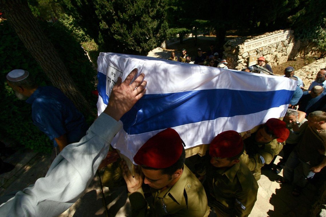 Flag-draped coffins are carried during a funeral in Israel. Photo: IDF Spokesman’s Unit / Wikimedia Commons / CC BY-SA 3.0 Flag-draped coffins are carried during a funeral in Israel. Photo: IDF Spokesman’s Unit / Wikimedia Commons / CC BY-SA 3.0