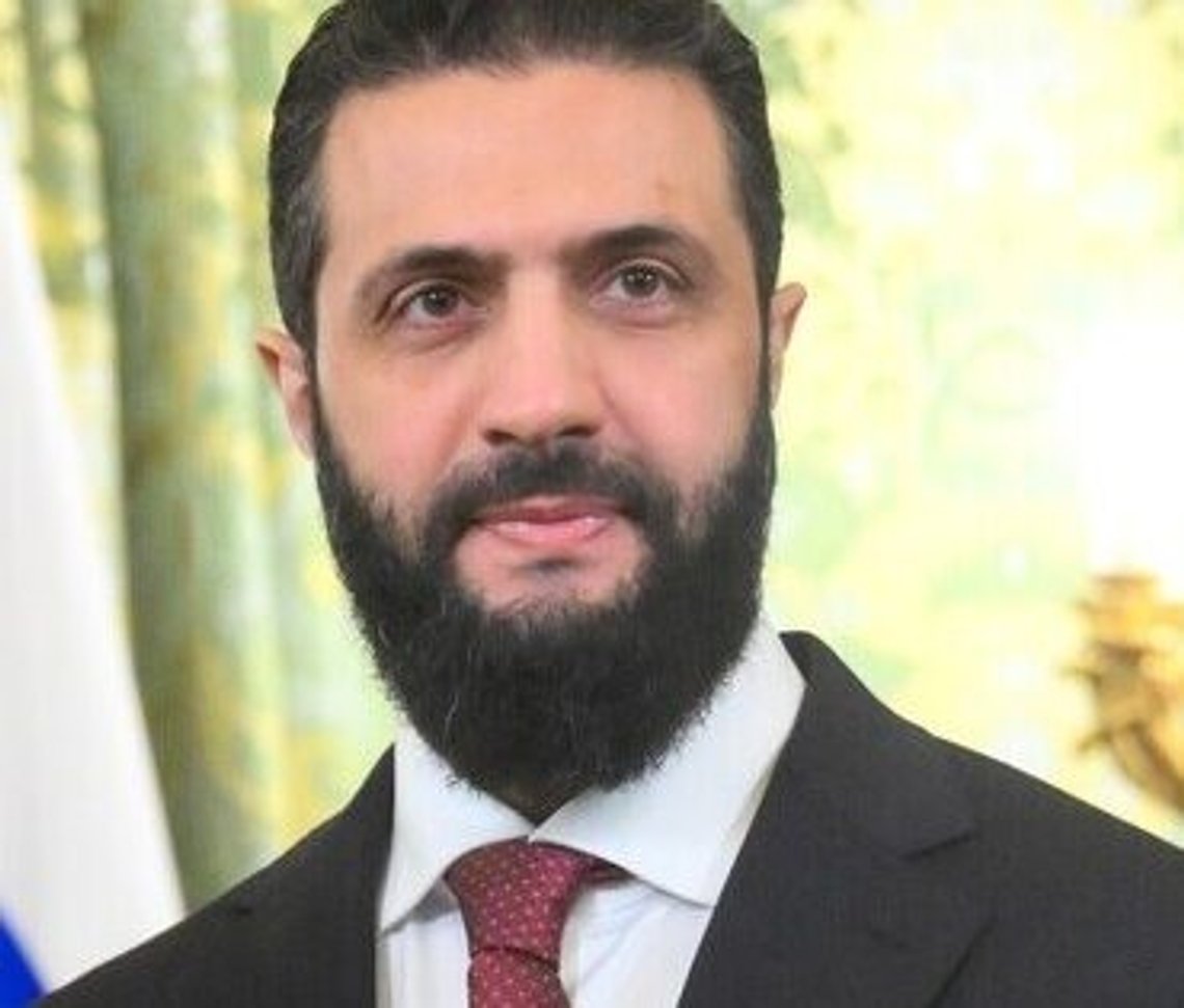 The President of the Syrian Arab Republic, Ahmed al-Sharaa at the Kremlin Palace in Moscow, Russia. For many years, he was widely known by his nom de guerre (war name) Abu Mohammad al-Julani (also spelled al-Jolani, al-Golani, or al-Jawlani), which he used while leading jihadist groups linked to al-Qaeda and later Hayat Tahrir al-Sham (HTS). Credit: Credit: Press Service of the President of the Republic of Azerbaijan / Wikimedia Commons, licensed under CC BY 4.0 The President of the Syrian Arab Republic, Ahmed al-Sharaa at the Kremlin Palace in Moscow, Russia. For many years, he was widely known by his nom de guerre (war name) Abu Mohammad al-Julani (also spelled al-Jolani, al-Golani, or al-Jawlani), which he used while leading jihadist groups linked to al-Qaeda and later Hayat Tahrir al-Sham (HTS). Credit: Credit: Press Service of the President of the Republic of Azerbaijan / Wikimedia Commons, licensed under CC BY 4.0