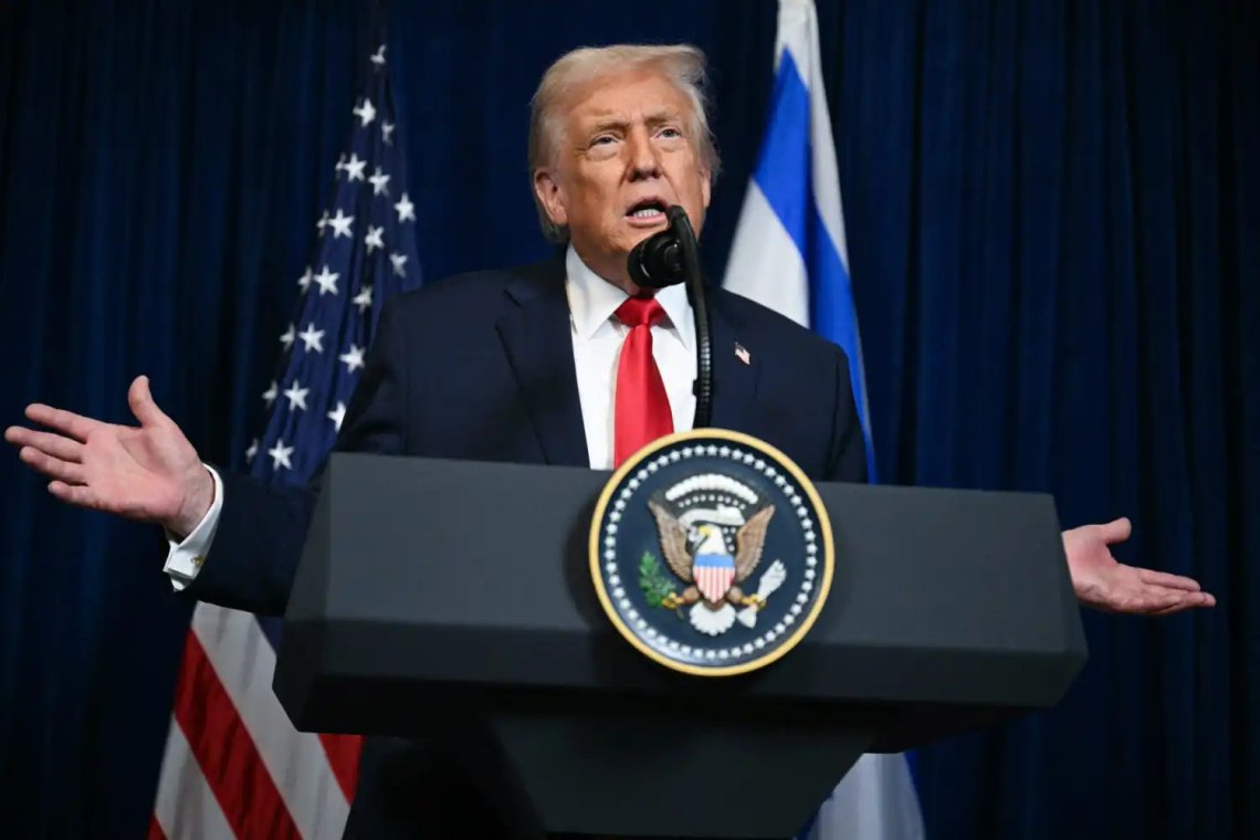 President Donald Trump speaking at a podium during a public address.
Photo: White House / Public Domain President Donald Trump speaking at a podium during a public address.
Photo: White House / Public Domain