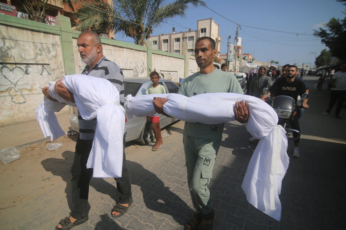 Relatives carry bodies from the Ganan family killed in an Israeli airstrike during their funeral in Khan Younis, Gaza Strip, Tuesday, Oct. 10, 2023. (AP Photo/Hatem Ali) Relatives carry bodies from the Ganan family killed in an Israeli airstrike during their funeral in Khan Younis, Gaza Strip, Tuesday, Oct. 10, 2023. (AP Photo/Hatem Ali)
