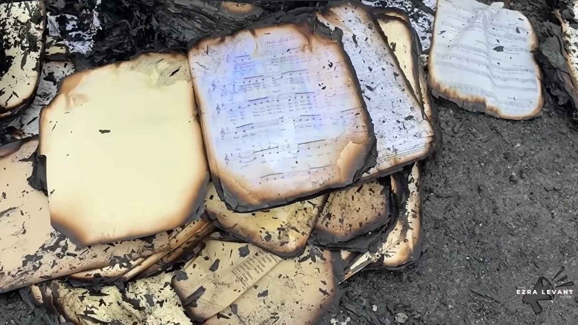 Notes lie burned in the ruins. Photo: Ezra Levant Notes lie burned in the ruins. Photo: Ezra Levant