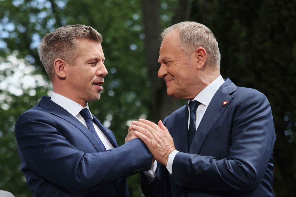 Poland's Prime Minister Donald Tusk, right, and Hungarian Prime Minister Peter Magyar shake hands after a joint press conference in Warsaw, Poland, Wednesday, May 20, 2026. Poland's Prime Minister Donald Tusk, right, and Hungarian Prime Minister Peter Magyar shake hands after a joint press conference in Warsaw, Poland, Wednesday, May 20, 2026.