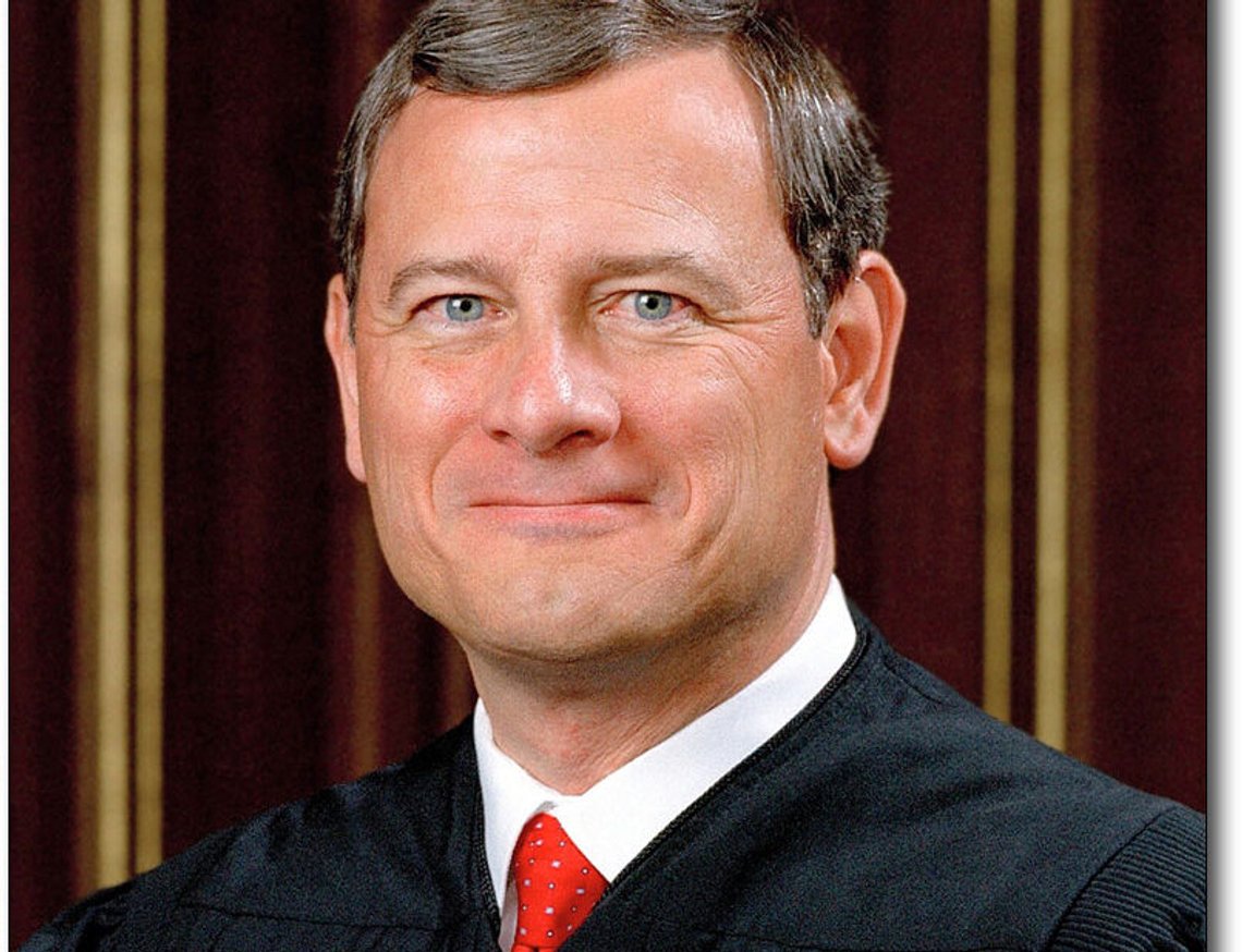 Chief Justice of the United States John Roberts joins other members of the Supreme Court as they pose for a new group portrait, at the Supreme Court building in Washington, Oct. 7, 2022. Roberts has declined an invitation to meet with Democratic senators to talk about Supreme Court ethics and the controversy over flags that flew outside homes owned by Justice Samuel Alito. Chief Justice of the United States John Roberts joins other members of the Supreme Court as they pose for a new group portrait, at the Supreme Court building in Washington, Oct. 7, 2022. Roberts has declined an invitation to meet with Democratic senators to talk about Supreme Court ethics and the controversy over flags that flew outside homes owned by Justice Samuel Alito.