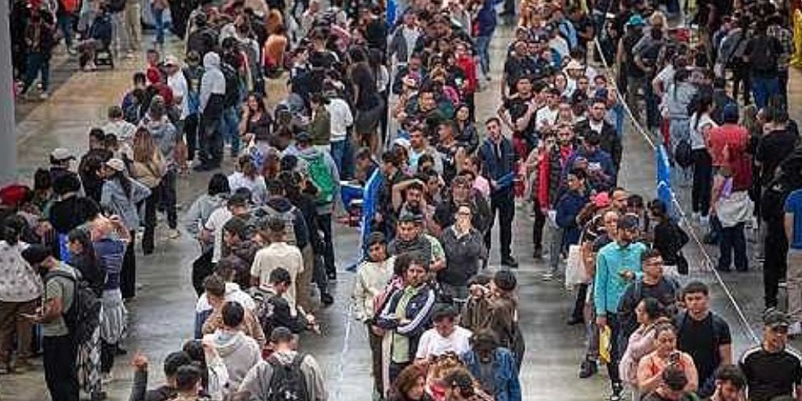 Undocumented immigrants and asylum seekers queue at a public office near Barcelona to receive application forms for residence permits on 21 April. Video still. Undocumented immigrants and asylum seekers queue at a public office near Barcelona to receive application forms for residence permits on 21 April. Video still.