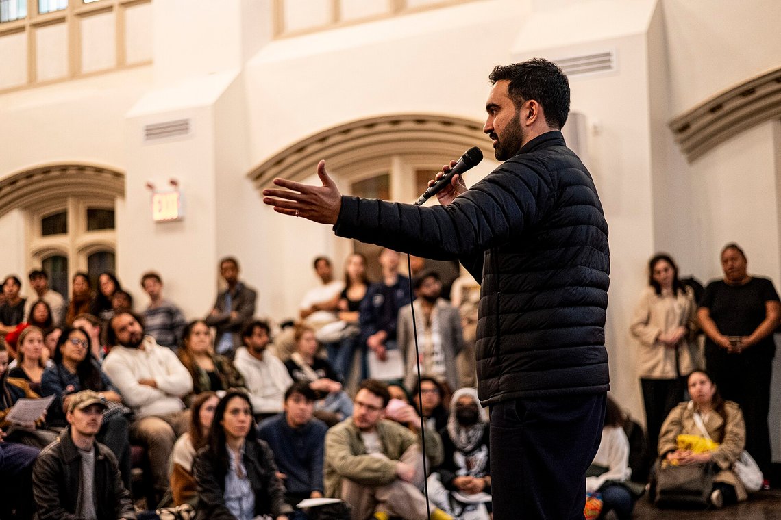 Zohran Mamdani speaking at a DSA 101 meeting at the Church of the Village in NYC. Photo: Wikimedia Commons. Zohran Mamdani speaking at a DSA 101 meeting at the Church of the Village in NYC. Photo: Wikimedia Commons.