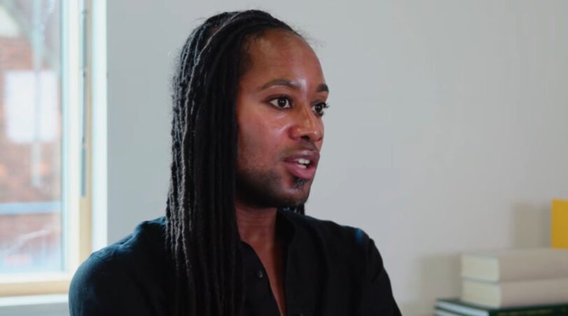 Jason Arday is the youngest professor ever appointed at Cambridge. He is now accused of being a complete fraud – a woke prince who embodies the woke ideology that has infected the West. Still from YouTube. Jason Arday is the youngest professor ever appointed at Cambridge. He is now accused of being a complete fraud – a woke prince who embodies the woke ideology that has infected the West. Still from YouTube.