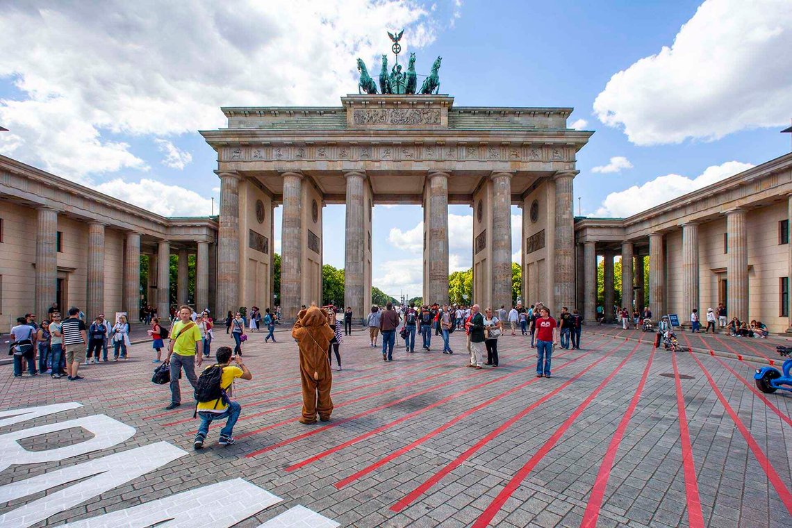 The Brandenburg Gate, at the end of the Unter den Linden boulevard in Berlin, was built in the early Neoclassical style and completed in 1791. In 1793, a four-horse chariot driven by the Roman goddess of peace was placed atop the gate. When France occupied Berlin in 1806, Napoleon sent the sculpture to Paris as war booty. It returned to Berlin in 1814, when the German eagle and the Prussian Iron Cross were added. The figure was simultaneously reinterpreted as Victoria, the Roman goddess of victory. Photo: Arnt Jensvoll The Brandenburg Gate, at the end of the Unter den Linden boulevard in Berlin, was built in the early Neoclassical style and completed in 1791. In 1793, a four-horse chariot driven by the Roman goddess of peace was placed atop the gate. When France occupied Berlin in 1806, Napoleon sent the sculpture to Paris as war booty. It returned to Berlin in 1814, when the German eagle and the Prussian Iron Cross were added. The figure was simultaneously reinterpreted as Victoria, the Roman goddess of victory. Photo: Arnt Jensvoll