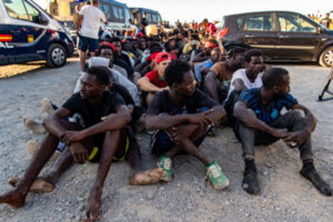 Migrants who crossed from Morocco into Spain line up for food distribution on a beach in the Spanish enclave of Ceuta, Monday, Aug. 3, 2026. (AP Photo/Antonio Sempere) Migrants who crossed from Morocco into Spain line up for food distribution on a beach in the Spanish enclave of Ceuta, Monday, Aug. 3, 2026. (AP Photo/Antonio Sempere)