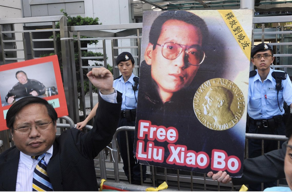 Demonstrators in Hong Kong demanding Liu Xiaobo's release following his Nobel Peace Prize award in 2010. Photo: Voice of America - Licence: Public domain (US federal government work) Demonstrators in Hong Kong demanding Liu Xiaobo's release following his Nobel Peace Prize award in 2010. Photo: Voice of America - Licence: Public domain (US federal government work)
