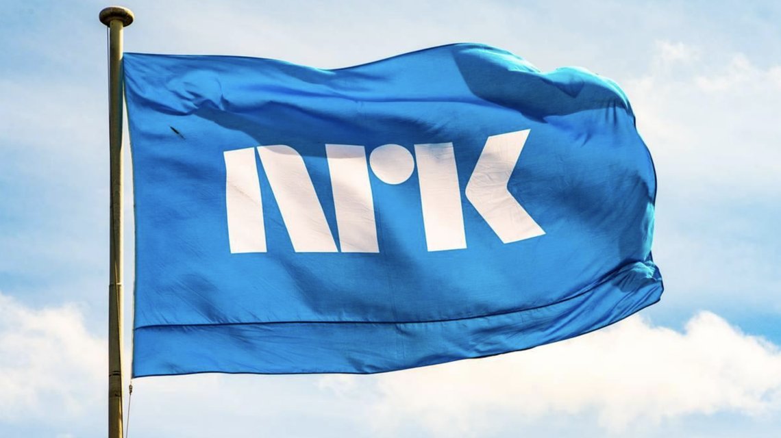 The flag of NRK, Norway's public broadcaster. Illustration: Ved havet / Wikimedia Commons (public domain). The flag of NRK, Norway's public broadcaster. Illustration: Ved havet / Wikimedia Commons (public domain).