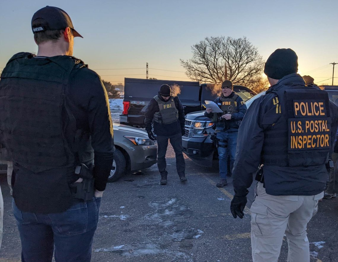 FBI agents and federal investigators preparing to execute search warrants during the Feeding Our Future investigation on 20 January 2022. Photo: FBI / US Department of Justice - public domain. FBI agents and federal investigators preparing to execute search warrants during the Feeding Our Future investigation on 20 January 2022. Photo: FBI / US Department of Justice - public domain.