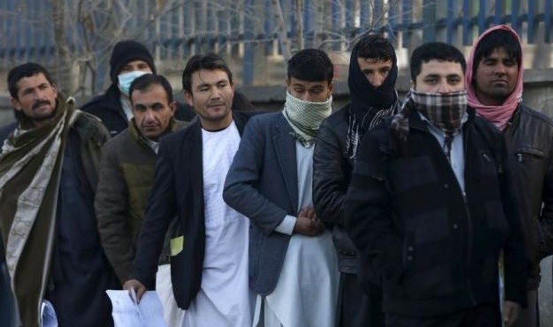 Afghan men queue up to apply for passports at a passport department office in Kabul, Afghanistan, November 29, 2015. REUTERS/Omar Sobhani Afghan men queue up to apply for passports at a passport department office in Kabul, Afghanistan, November 29, 2015. REUTERS/Omar Sobhani