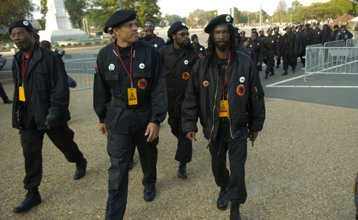 Members of The New Black Panther Party walk towards the US Capitol in Washington, DC, for the Million More Movement rally to commemorate the 10th anniversary of the Million Man March, Saturday, October 15, 2005. ( J.M. Eddins Jr. / The Washington Times )