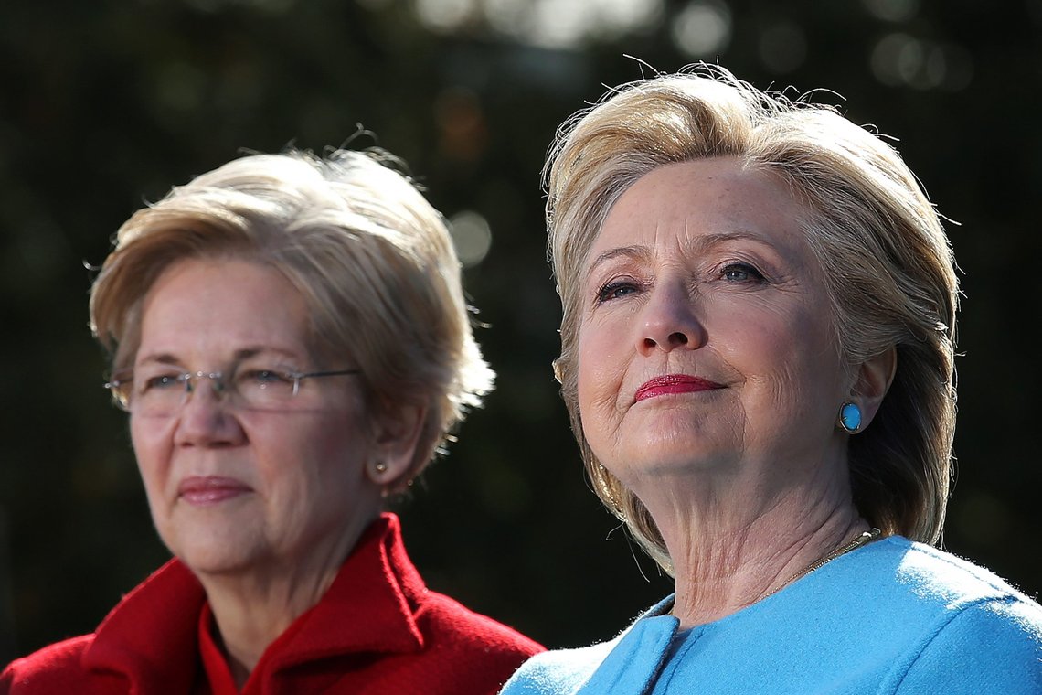 Democratic U.S. presidential nominee Hillary Clinton attends a campaign rally accompanied by U.S. Senator Elizabeth Warren (D-MA) at Alumni Hall Courtyard, Saint Anselm College in Manchester, New Hampshire U.S., October 24, 2016. REUTERS/Carlos Barria Democratic U.S. presidential nominee Hillary Clinton attends a campaign rally accompanied by U.S. Senator Elizabeth Warren (D-MA) at Alumni Hall Courtyard, Saint Anselm College in Manchester, New Hampshire U.S., October 24, 2016. REUTERS/Carlos Barria
