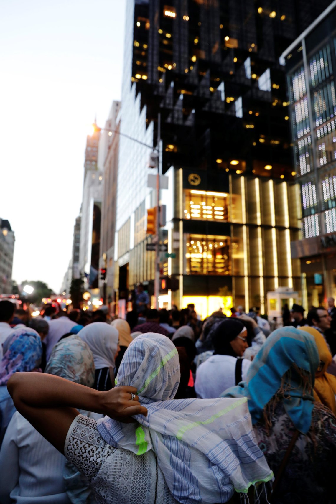 A Muslim woman prepares to pray with interfaith supporters during a demonstration and Iftar celebration during Ramadan outside of Trump Tower in New York, U.S., June 1, 2017. REUTERS/Lucas Jackson A Muslim woman prepares to pray with interfaith supporters during a demonstration and Iftar celebration during Ramadan outside of Trump Tower in New York, U.S., June 1, 2017. REUTERS/Lucas Jackson