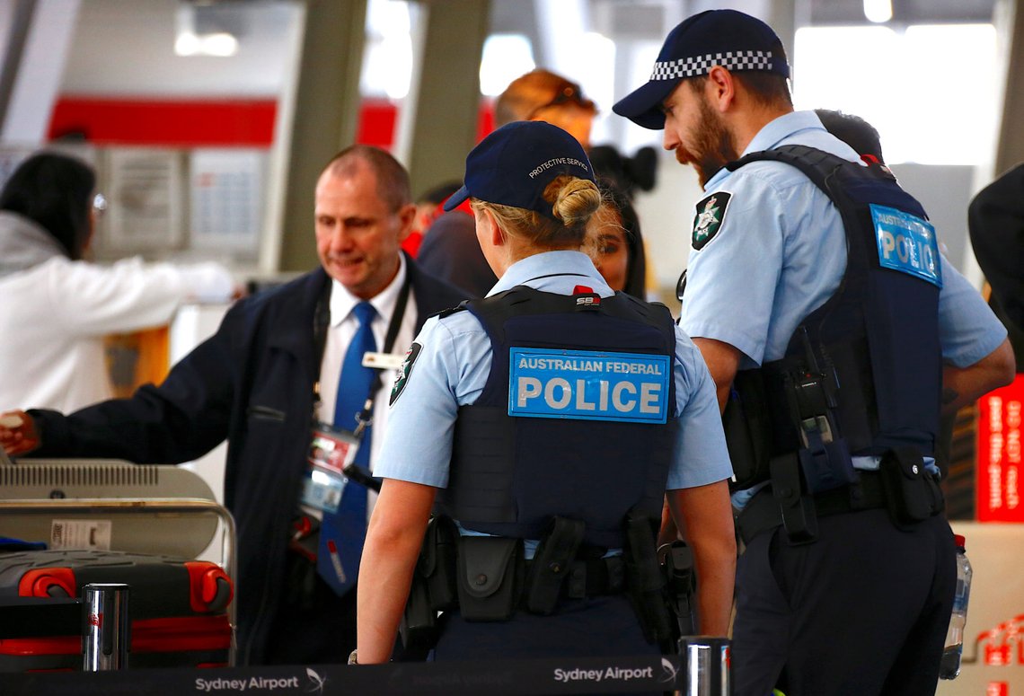 Det australske politiet melder at en internasjonal politioperasjon mot organisert kriminalitet har ført til hundrevis av pågripelser de siste dagene. Foto: David Gray / Reuters / NTB Det australske politiet melder at en internasjonal politioperasjon mot organisert kriminalitet har ført til hundrevis av pågripelser de siste dagene. Foto: David Gray / Reuters / NTB