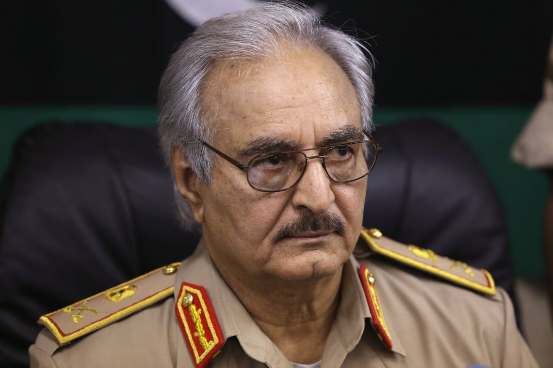 Then-General Khalifa Haftar speaks during a news conference in Abyar, east of Benghazi May 31, 2014. Growing frustration over the reality of life in eastern Libya, which contrasts with the promises of politicians, is feeding support for Haftar, who has set himself up as a warrior against Islamist militancy and who some also see as their saviour. Picture taken May 31, 2014. REUTERS/Esam Omran Al-Fetori (LIBYA - Tags: CIVIL UNREST POLITICS MILITARY) Then-General Khalifa Haftar speaks during a news conference in Abyar, east of Benghazi May 31, 2014. Growing frustration over the reality of life in eastern Libya, which contrasts with the promises of politicians, is feeding support for Haftar, who has set himself up as a warrior against Islamist militancy and who some also see as their saviour. Picture taken May 31, 2014. REUTERS/Esam Omran Al-Fetori (LIBYA - Tags: CIVIL UNREST POLITICS MILITARY)