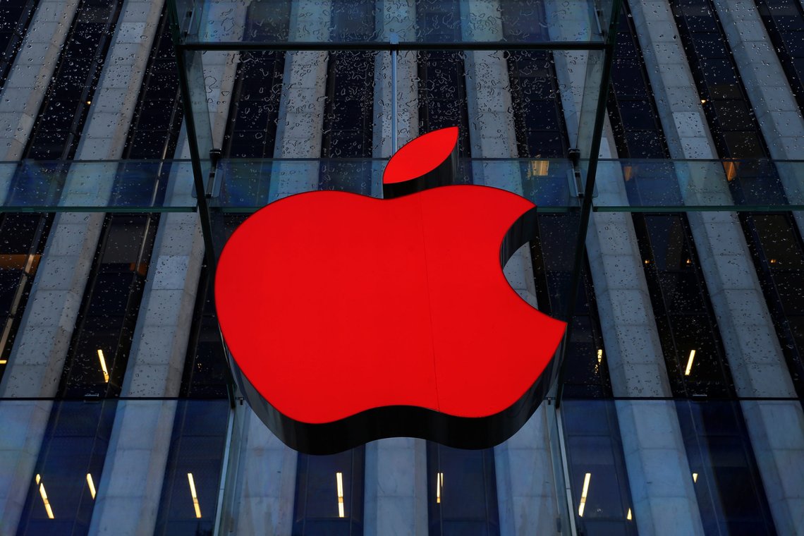 An Apple logo hangs above the entrance to the Apple store on 5th Avenue in the Manhattan borough of New York City, U.S., December 5, 2016. REUTERS/Brendan McDermid An Apple logo hangs above the entrance to the Apple store on 5th Avenue in the Manhattan borough of New York City, U.S., December 5, 2016. REUTERS/Brendan McDermid