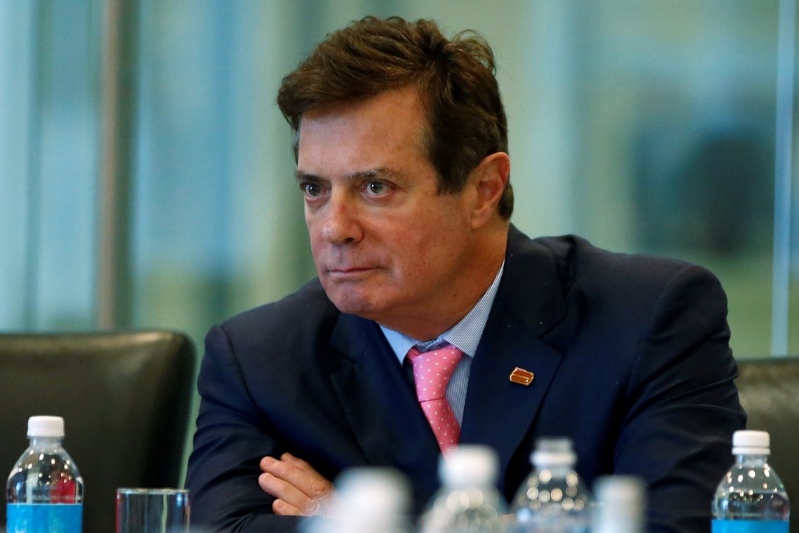 FILE PHOTO: Paul Manafort of Republican presidential nominee Donald Trump's staff listens during a round table discussion on security at Trump Tower in the Manhattan borough of New York, U.S., August 17, 2016. REUTERS/Carlo Allegri/File Photo FILE PHOTO: Paul Manafort of Republican presidential nominee Donald Trump's staff listens during a round table discussion on security at Trump Tower in the Manhattan borough of New York, U.S., August 17, 2016. REUTERS/Carlo Allegri/File Photo