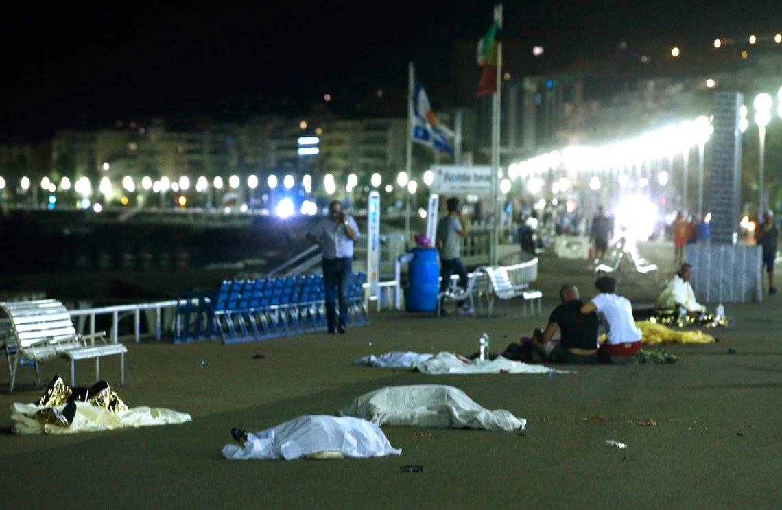 ATTENTION EDITORS - VISUAL COVERAGE OF SCENES OF INJURY OR DEATH - Bodies are seen on the ground July 15, 2016 after at least 30 people were killed in Nice, France, when a truck ran into a crowd celebrating the Bastille Day national holiday, July 14, 2016. REUTERS/Eric Gaillard TEMPLATE OUT. ATTENTION EDITORS - VISUAL COVERAGE OF SCENES OF INJURY OR DEATH - Bodies are seen on the ground July 15, 2016 after at least 30 people were killed in Nice, France, when a truck ran into a crowd celebrating the Bastille Day national holiday, July 14, 2016. REUTERS/Eric Gaillard TEMPLATE OUT.