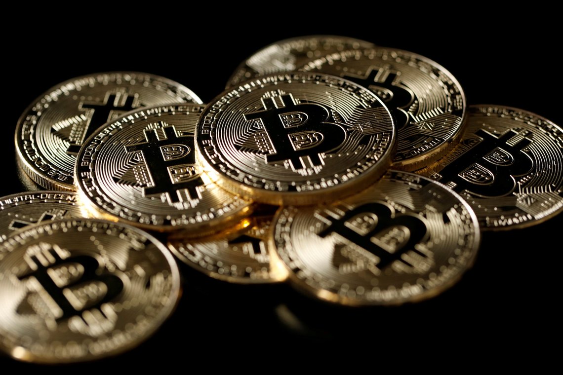 FILE PHOTO: A collection of Bitcoin (virtual currency) tokens are displayed in this picture illustration taken December 8, 2017. REUTERS/Benoit Tessier/Illustration/File Photo FILE PHOTO: A collection of Bitcoin (virtual currency) tokens are displayed in this picture illustration taken December 8, 2017. REUTERS/Benoit Tessier/Illustration/File Photo
