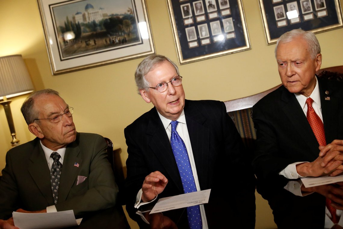 (L-R) Sen. Chuck Grassley (R-IA), Senate Majority Leader Mitch McConnell, Sen. Orrin Hatch introduce the Republican tax reform plan at the U.S. Capitol in Washington, U.S., November 9, 2017. REUTERS/Aaron P. Bernstein (L-R) Sen. Chuck Grassley (R-IA), Senate Majority Leader Mitch McConnell, Sen. Orrin Hatch introduce the Republican tax reform plan at the U.S. Capitol in Washington, U.S., November 9, 2017. REUTERS/Aaron P. Bernstein