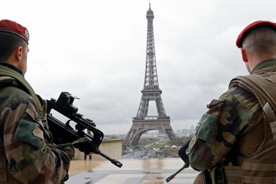 French army paratroopers patrol near the Eiffel tower in Paris, France, March 30, 2016 as France has decided to deploy 1,600 additional police officers to bolster security at its borders and on public transport following the deadly blasts in Brussels. REUTERS/Philippe Wojazer French army paratroopers patrol near the Eiffel tower in Paris, France, March 30, 2016 as France has decided to deploy 1,600 additional police officers to bolster security at its borders and on public transport following the deadly blasts in Brussels. REUTERS/Philippe Wojazer