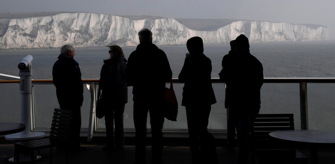 Passengers view the white cliffs of Dover, the closest British coastline to mainland Europe, from a cross-channel ferry between Dover in Britain and Calais in France, March 27, 2017. REUTERS/Toby Melville TPX IMAGES OF THE DAY Passengers view the white cliffs of Dover, the closest British coastline to mainland Europe, from a cross-channel ferry between Dover in Britain and Calais in France, March 27, 2017. REUTERS/Toby Melville TPX IMAGES OF THE DAY