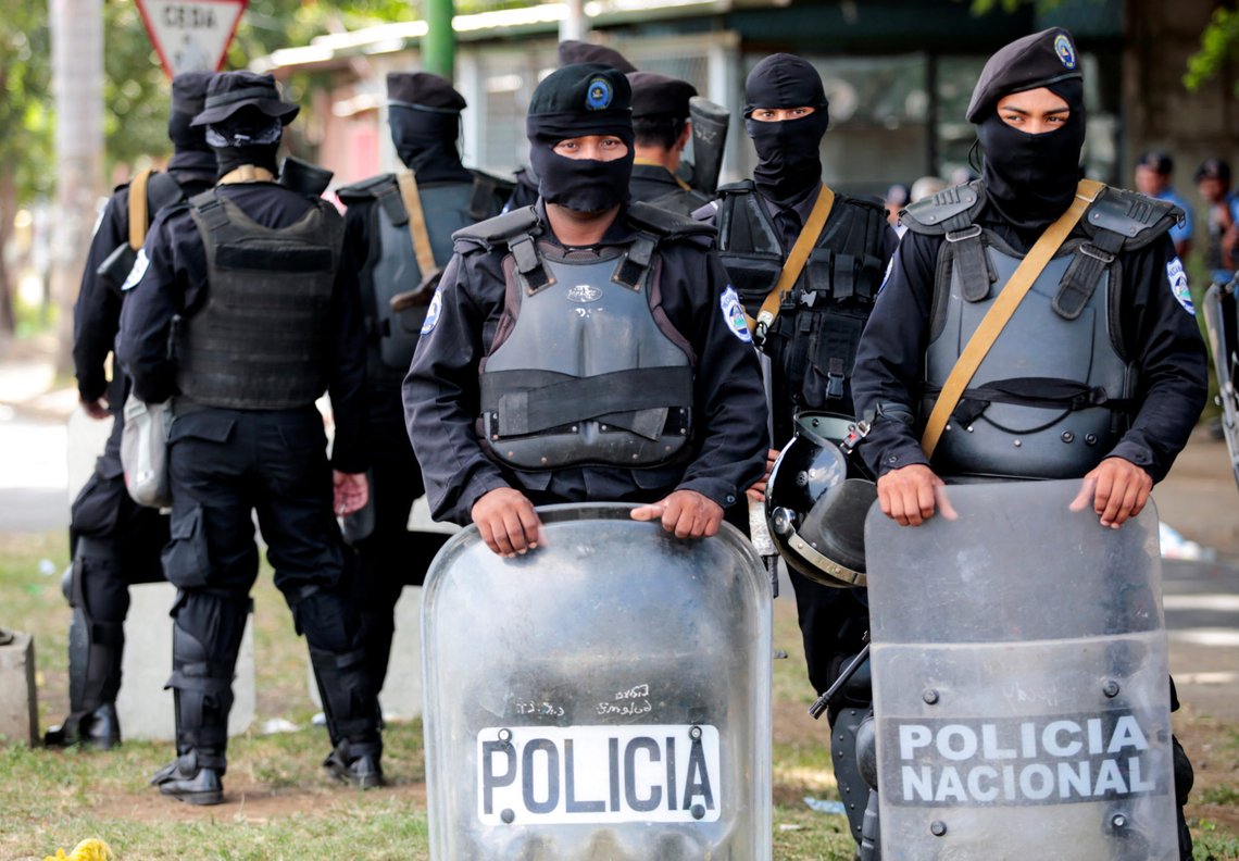 Police officers stand guard near a march in support of Nicaragua's President Daniel Ortega in Managua, Nicaragua July 28, 2018. REUTERS/Oswaldo Rivas Police officers stand guard near a march in support of Nicaragua's President Daniel Ortega in Managua, Nicaragua July 28, 2018. REUTERS/Oswaldo Rivas