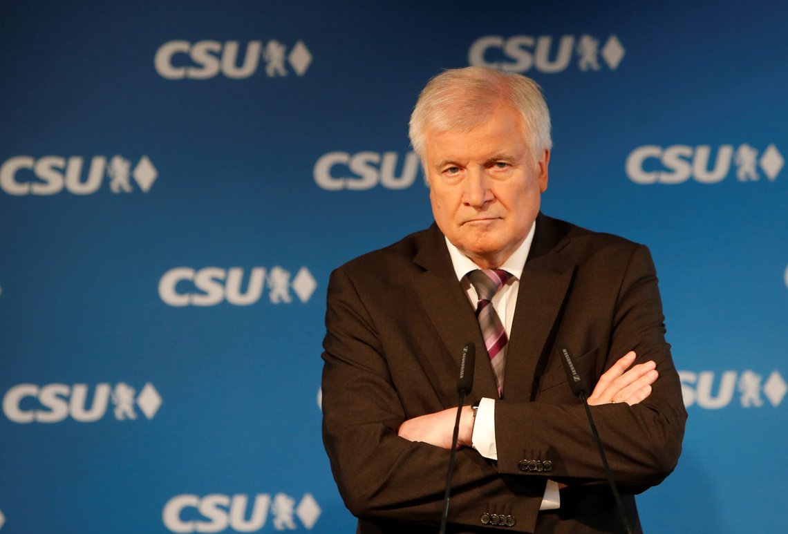 German Federal Interior Minister Horst Seehofer and Bavarian State Prime Minister Markus Soeder of the Christian Social Union (CSU) address a news conference following a board meeting after the Bavarian state elections in Munich, Germany October 15, 2018. REUTERS/Michaela Rehle German Federal Interior Minister Horst Seehofer and Bavarian State Prime Minister Markus Soeder of the Christian Social Union (CSU) address a news conference following a board meeting after the Bavarian state elections in Munich, Germany October 15, 2018. REUTERS/Michaela Rehle