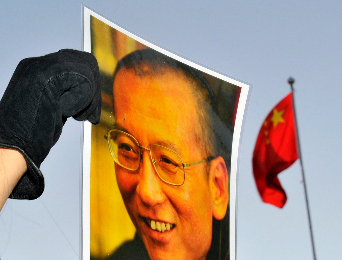 A protester holds an image of jailed dissident Liu Xiaobo outside the Chinese Embassy in Oslo, in this file picture taken December 9, 2010. A group of "princelings", children of China's political elite, has quietly urged the Communist Party leadership to release jailed Nobel laureate Liu Xiaobo on parole to improve the country's international image, two sources said. To match story CHINA-DISSIDENT/ REUTERS/Toby Melville/Files (NORWAY - Tags: CIVIL UNREST POLITICS) A protester holds an image of jailed dissident Liu Xiaobo outside the Chinese Embassy in Oslo, in this file picture taken December 9, 2010. A group of "princelings", children of China's political elite, has quietly urged the Communist Party leadership to release jailed Nobel laureate Liu Xiaobo on parole to improve the country's international image, two sources said. To match story CHINA-DISSIDENT/ REUTERS/Toby Melville/Files (NORWAY - Tags: CIVIL UNREST POLITICS)