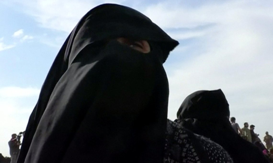 Um Walaa, originally from Morocco with French nationality, and widow of an Islamic state fighter, is seen near Baghouz, Syria in this still image taken from a video shot on March 5, 2019. ReutersTV via REUTERS Um Walaa, originally from Morocco with French nationality, and widow of an Islamic state fighter, is seen near Baghouz, Syria in this still image taken from a video shot on March 5, 2019. ReutersTV via REUTERS